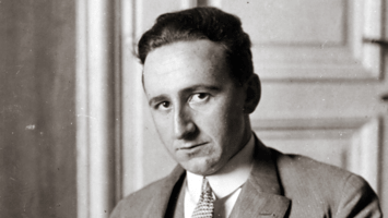 A photograph of a clean-shaven F. A. Hayek as a relatively young man.