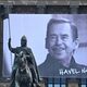 A banner honoring Václav Havel hangs from the National Museum at Wenceslas Square in Prague, with an equestrian statue of Saint Wenceslas in the foreground. (David Sedlecký/Wikimedia Commons)