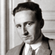 A photograph of a clean-shaven F. A. Hayek as a relatively young man.