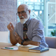 A photo of Eric Mack speaking to employees of the Cato Institute in October 2024.