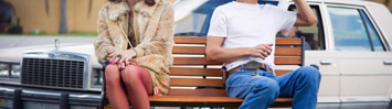 Jared Leto and McConaughey sit on a park bench together. 