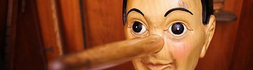 A wooden puppet with a long nose.