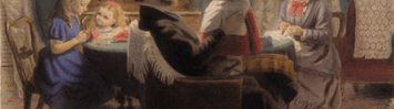 A family sits around a table. A child sits in her father's lap, arms outstretched.