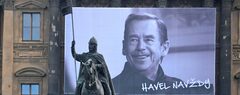 A banner honoring Václav Havel hangs from the National Museum at Wenceslas Square in Prague, with an equestrian statue of Saint Wenceslas in the foreground. (David Sedlecký/Wikimedia Commons)
